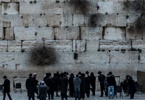 Praying at the Western Wall, Jerusalem orthodox men at Western Wall Jerusalem