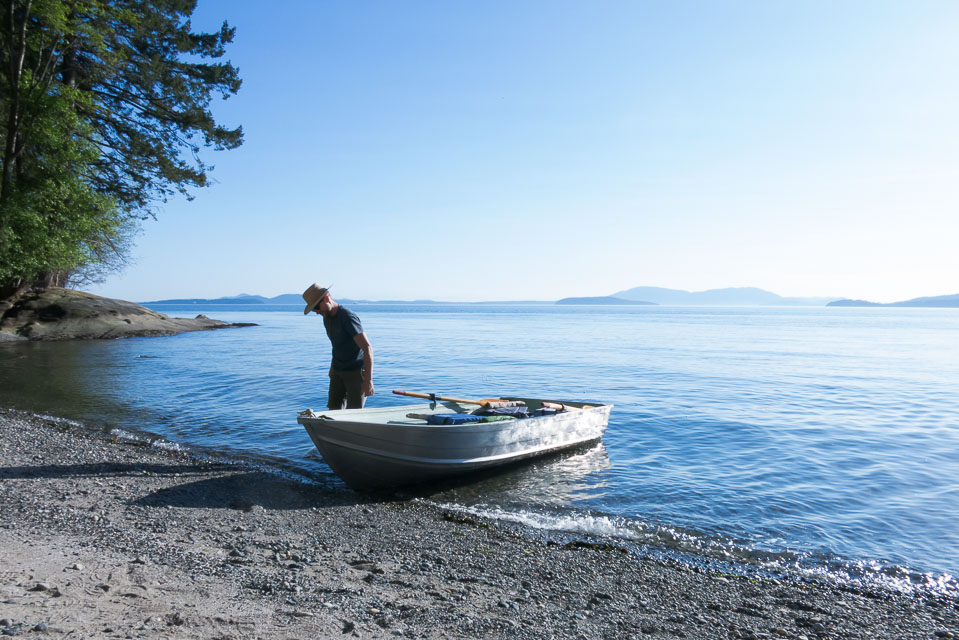 Lucas Henning hunts for agates along the shore of Puget Sound, south of Bellingham, Washington