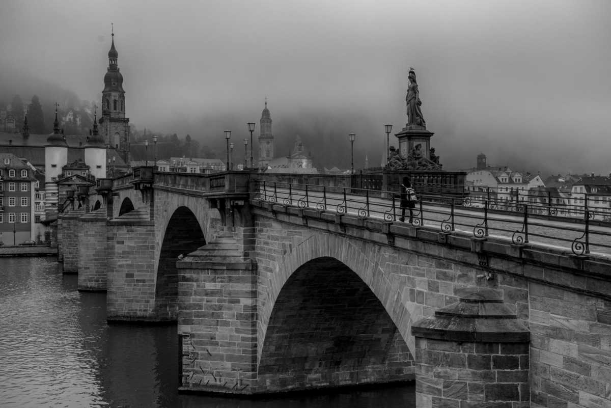 old bridge fog heidelberg germany