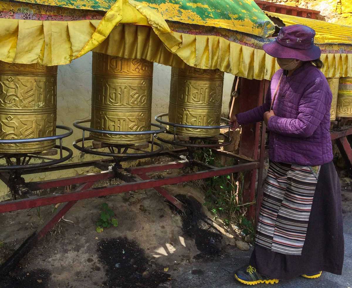 Prayer wheels outside Potala Palace, Lhasa, Tibet