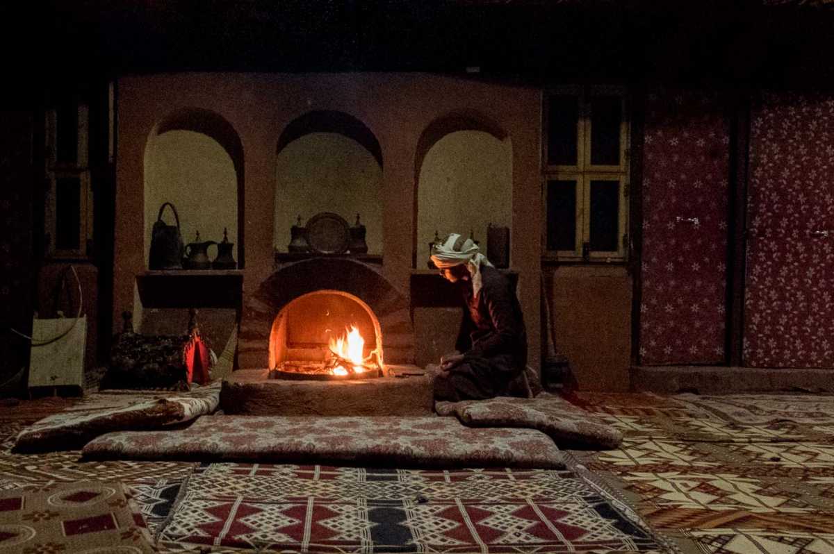 bedouin boy building a fire wadi rum jordan