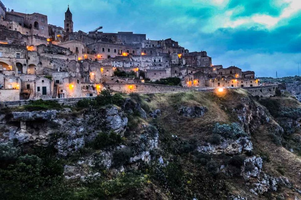 Matera Italy at twilight on a drizzly evening. The lights provide the only color.