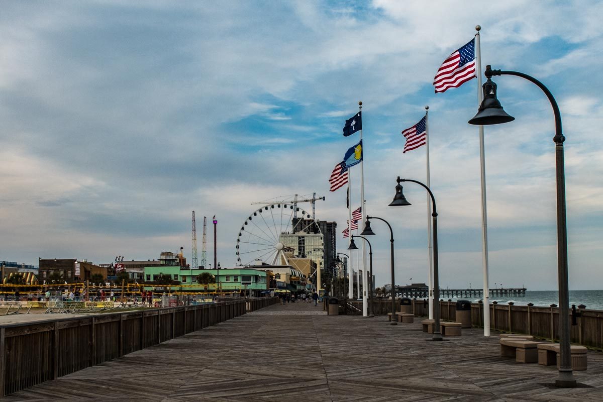 USA South Carolina Myrtle Beach boardwalk flags