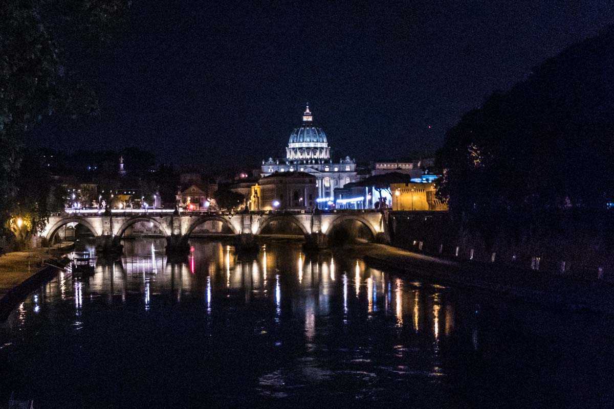 saint peters basilica reflected in the tiber rome italy