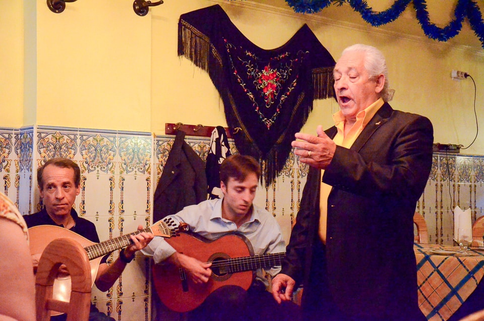 fado singer in alfama neighborhood lisbon portugal