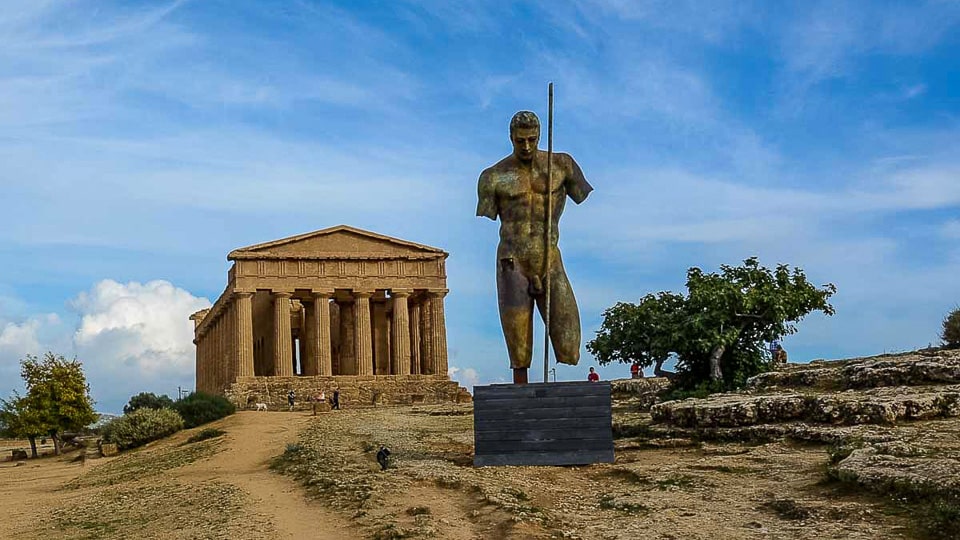 A modern statue of Daedelus by Igor Mitoraj which was then placed near the restored Temple of Concordia in Agrigento, Sicily. It has since been moved to Pompeii.