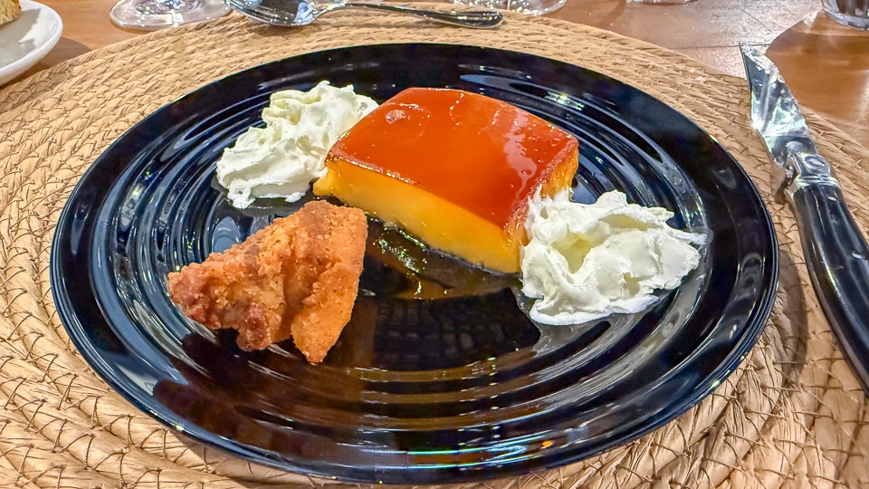 Chicharrón pork crackling beside tocino de cielo egg yolk dessert served at a sherry tasting at Bodega León Domecq Jerez de la Frontera