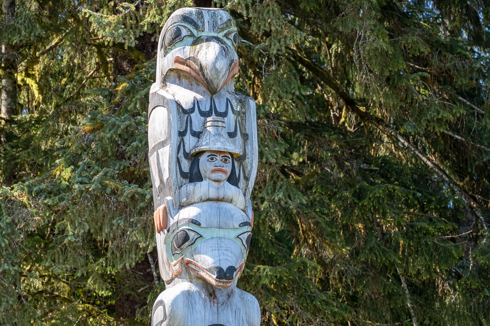 Totem pole at Glacier Bay Lodge honoring the Huna Tlingit clans displaced by the Little Ice Age